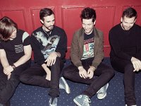 Bastille  Casual photo of Dan Smith and Kyle Simmons wearing high top chucks.